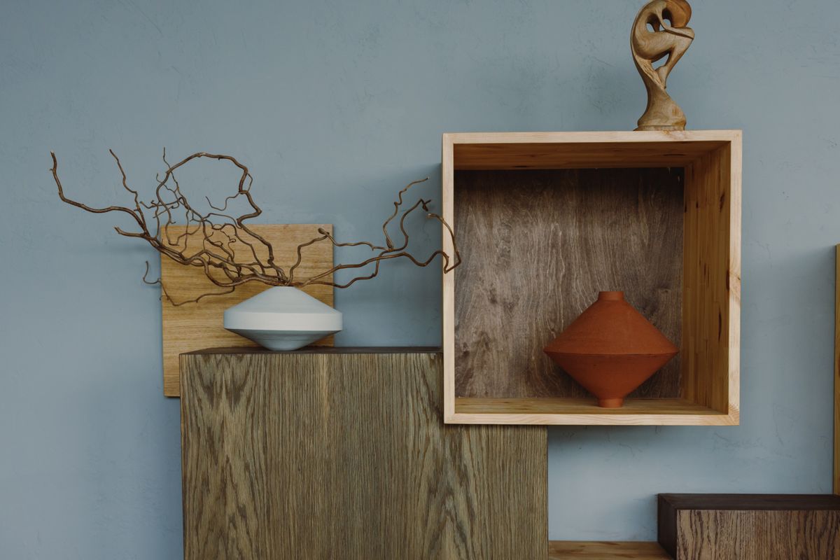 Ceramic vases and olive branches